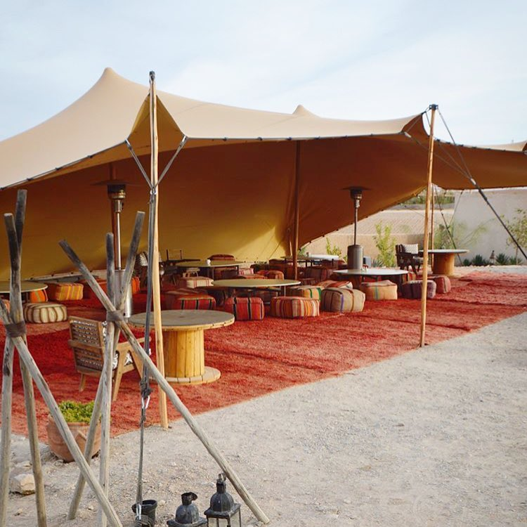 Flex tent with bohemian decor on a beach Flex tent with bohemian decor on a beach